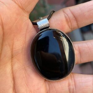 Handmade Southwestern oval onyx silver engraved bale necklace